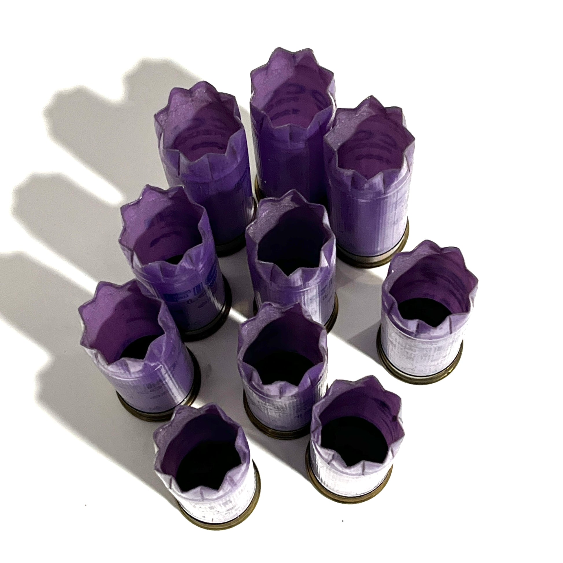 Purple empty shotgun hulls for crafts