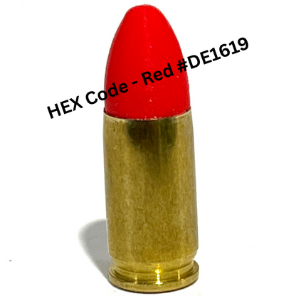 Single fake 9mm Luger dummy round with red painted tip on white background, text overlay reads HEX Code Red hashtag DE1619