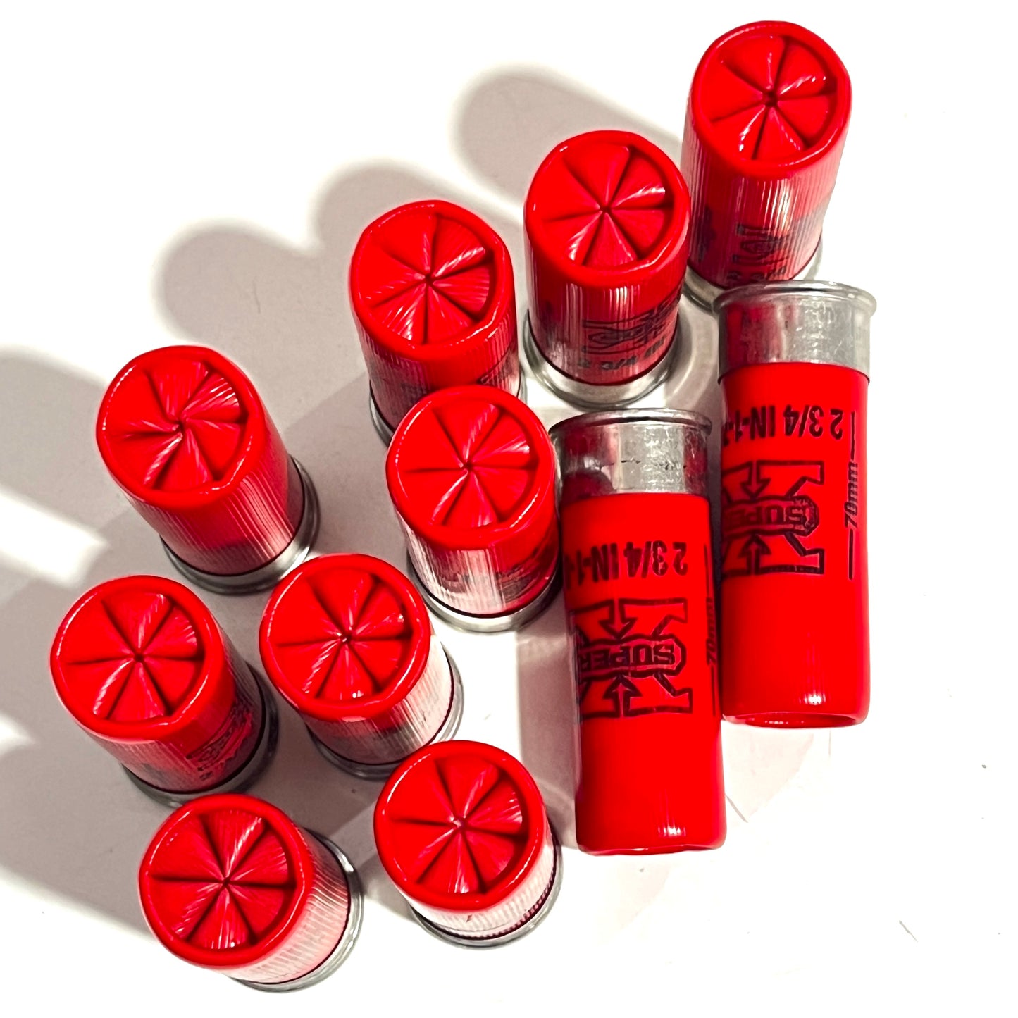 Ten Red Winchester Super X Hulls Bundled With Crimped Tops