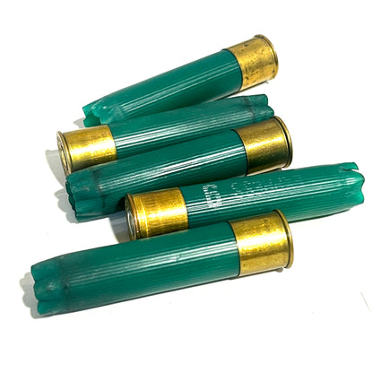 Five green 28 gauge high brass empty shotgun shells with brass bases on a plain white background.
