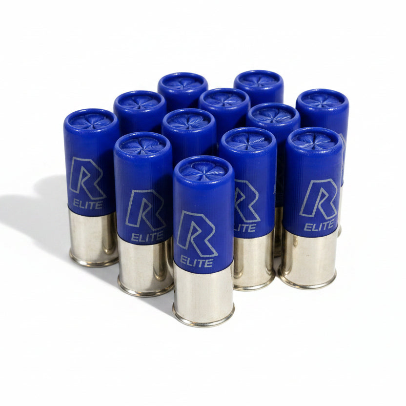 Nine blue and silver fake shotgun shell casings with white 'R ELITE' branding, arranged on a dark tabletop for movies and film.