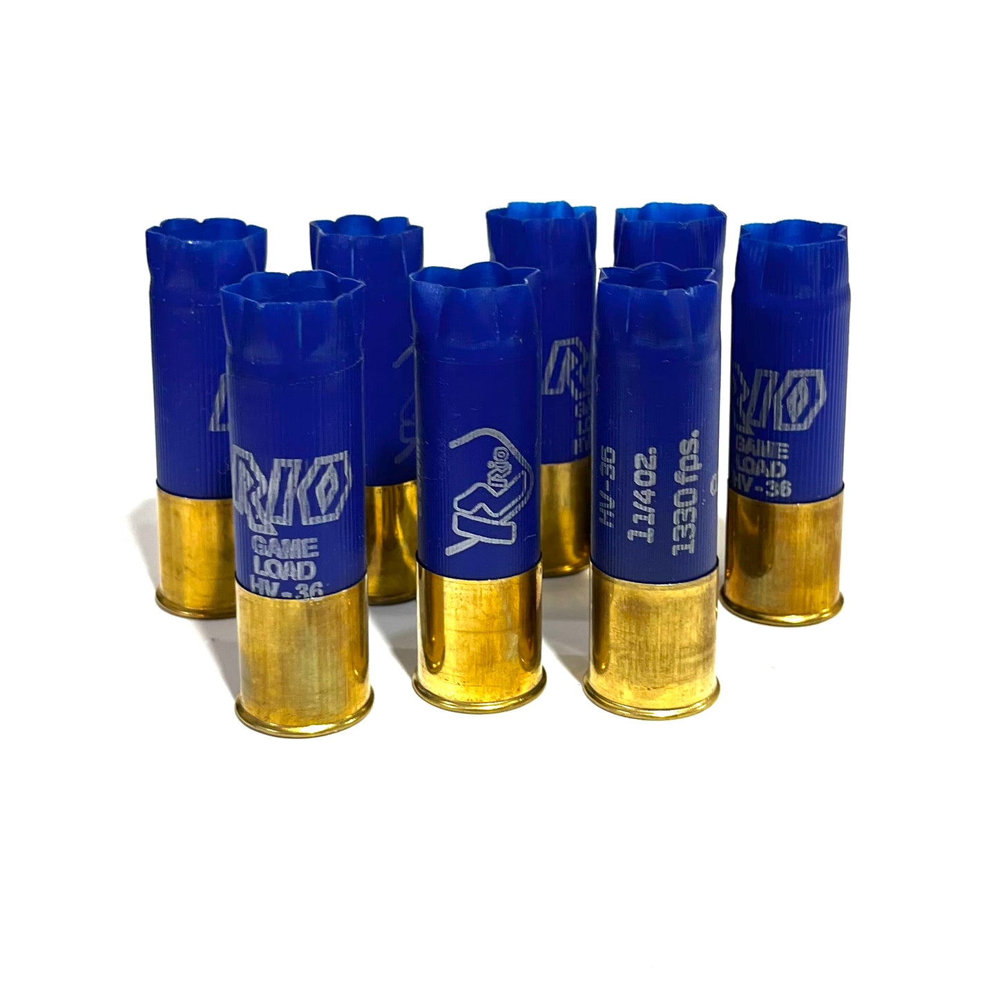 9 empty blue 12 gauge RIO Game Load shotgun shells with brass bases standing on a white background