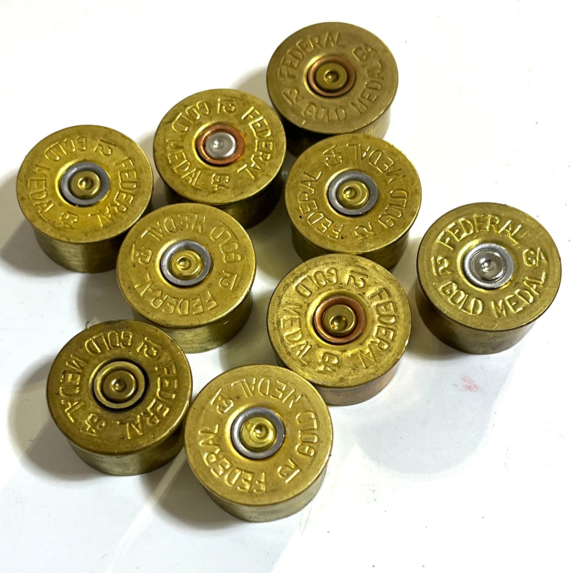 Shotgun shell brass headstamps converted into custom guitar knobs