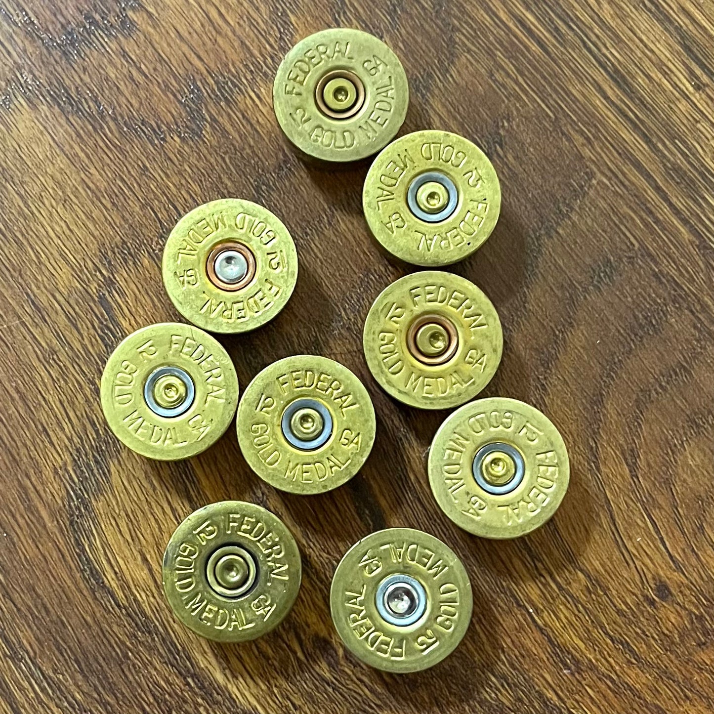 Federal Gold Medal shotgun shell headstamps repurposed as decorative knobs
