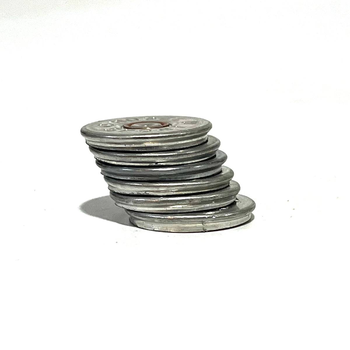 A stack of silver shotgun shell slices