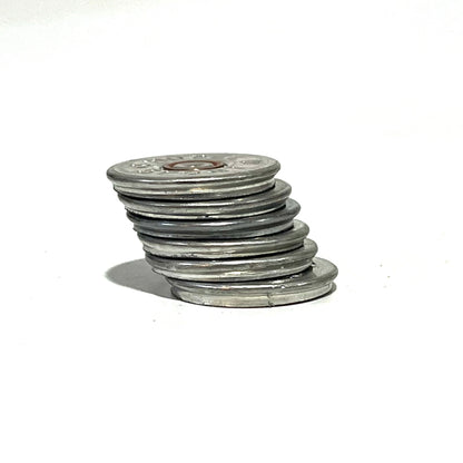 A stack of silver shotgun shell slices