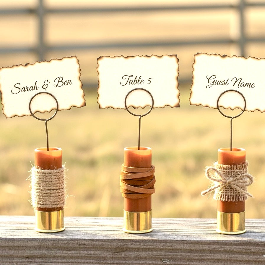 DIY wedding place card holders made from unmarked rose gold shotgun shells with high brass and spent primers.
