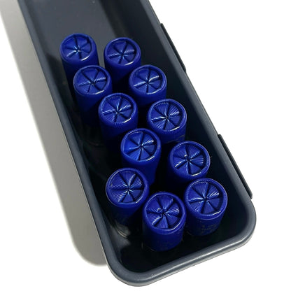 Fake blue shotgun shells 6 star crimp face up in a dark container