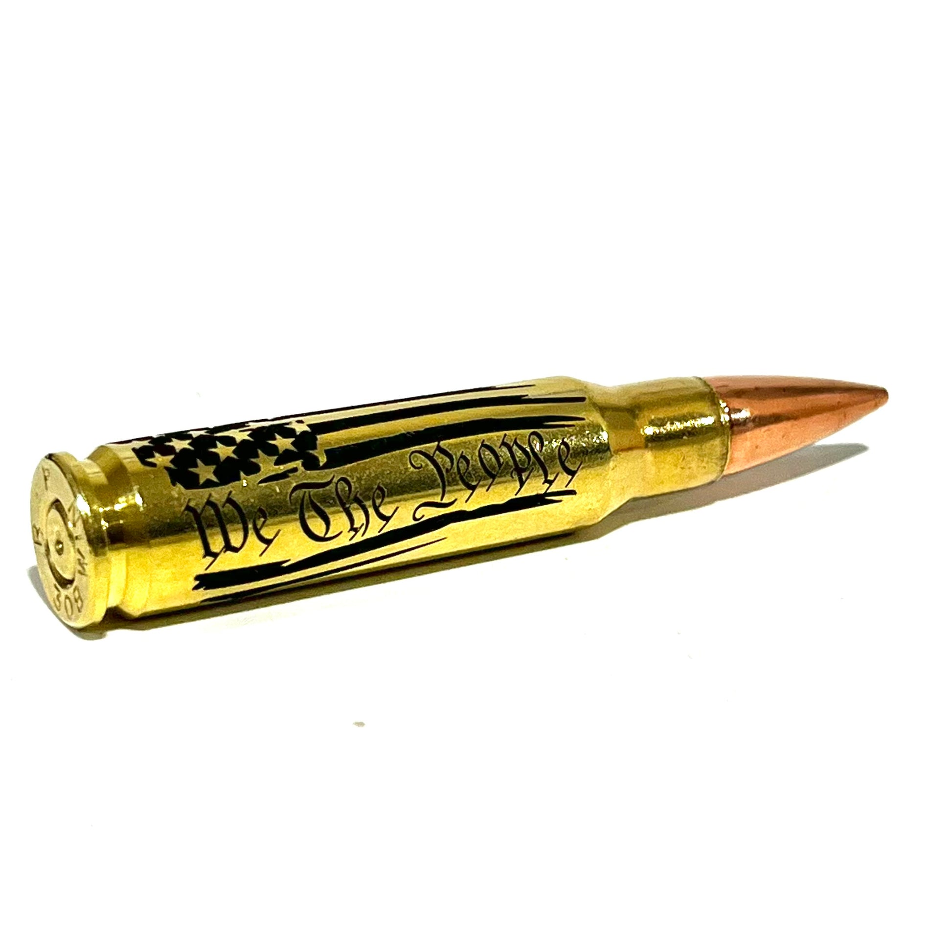 Brass .308 cartridge with 'We The People' engraving, case base facing forward on white background