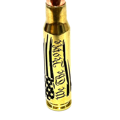 Vertically cropped brass .308 casing with full 'We The People' script and flag engraving