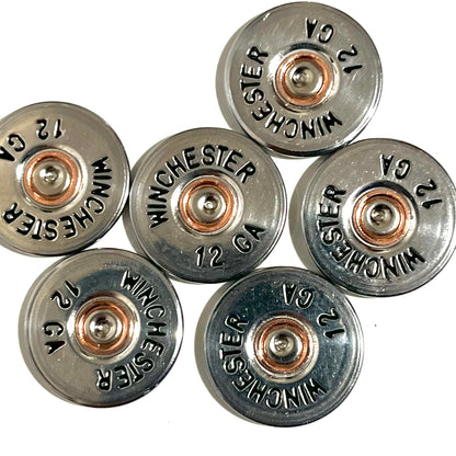 Six silver hand painted Winchester 12 gauge shell slices with visible headstamps arranged in a cluster.