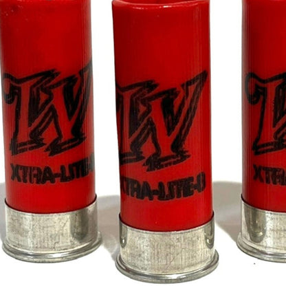 A close-up shot of red Winchester dummy rounds showing the black stylized W logo and XTRA-LITE markings.
