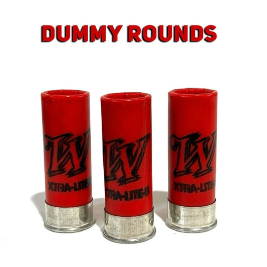 Three red Winchester dummy rounds standing upright with a black logo against a white background, text overlay: DUMMY ROUNDS.
