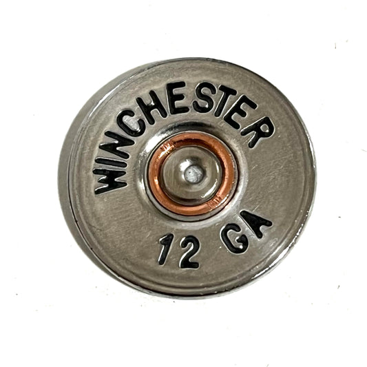 A hand-painted silver and black Winchester 12 gauge shotgun shell slice with a stamped headstamp and copper  spent primer.