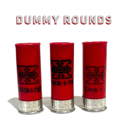 Three red once-fired Winchester Super X 12 gauge dummy rounds standing upright with black X,silver bases and  headstamps