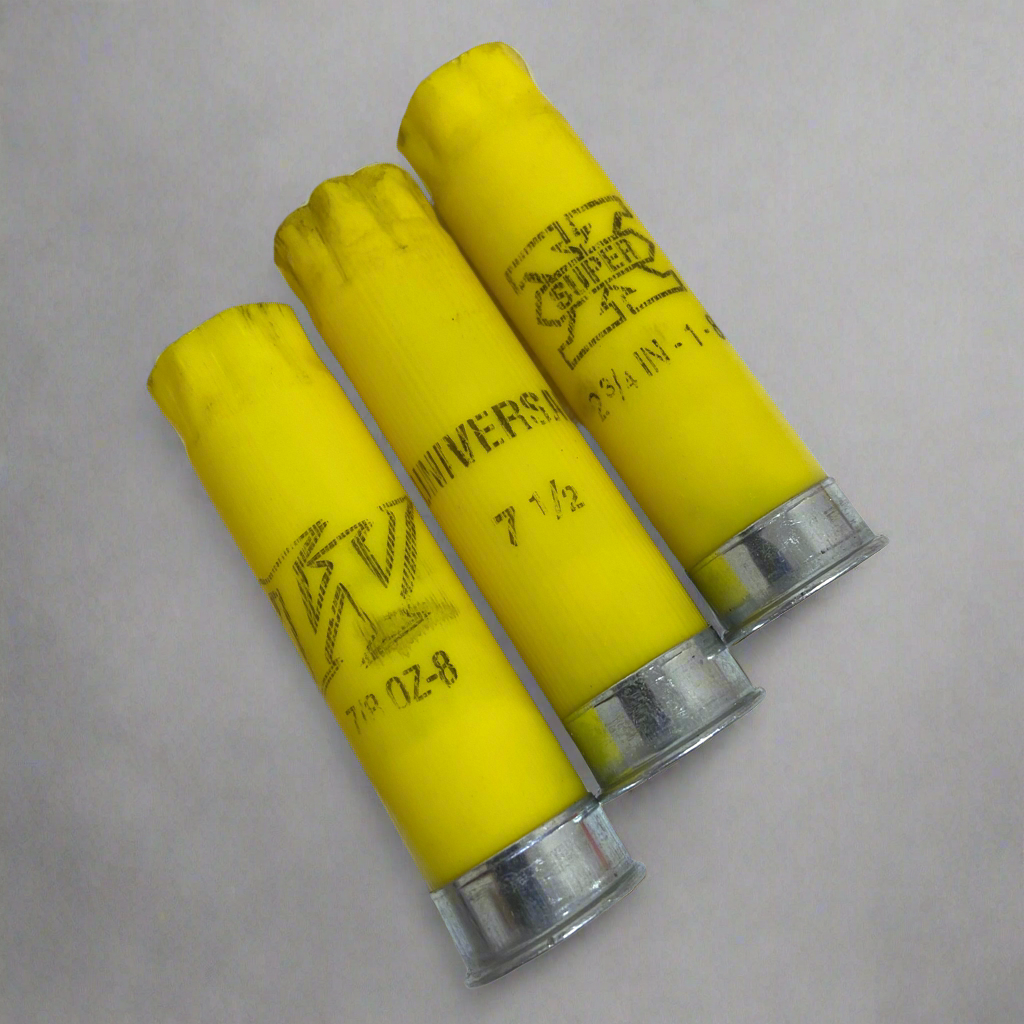 Three yellow shotgun shells with silver bottoms showing Universal and Super X headstamp printing