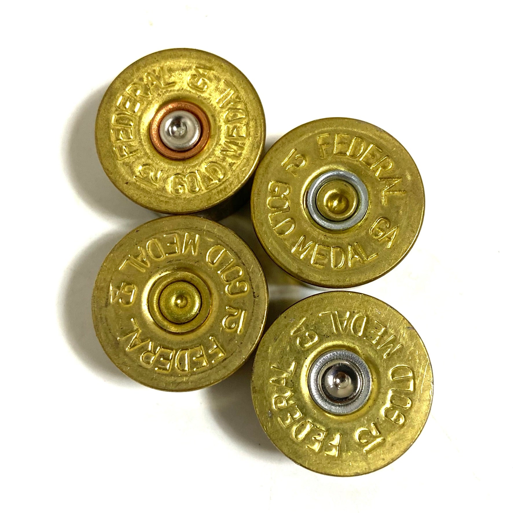 Gold-toned 12 gauge Federal headstamps used for crafting and jewelry making