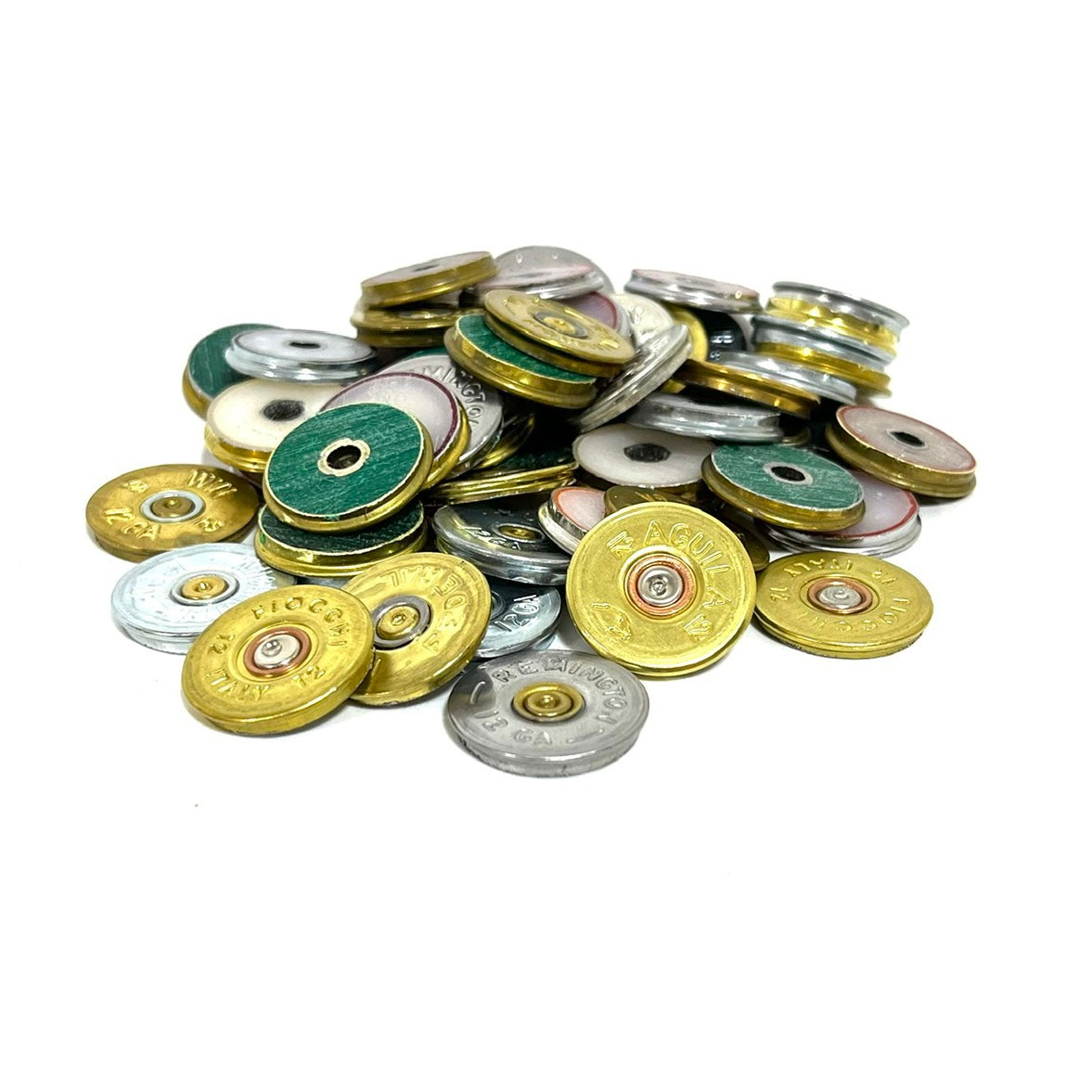 Bulk pile of mixed gold and silver 12 gauge shotgun shell headstamp slices on a white background.