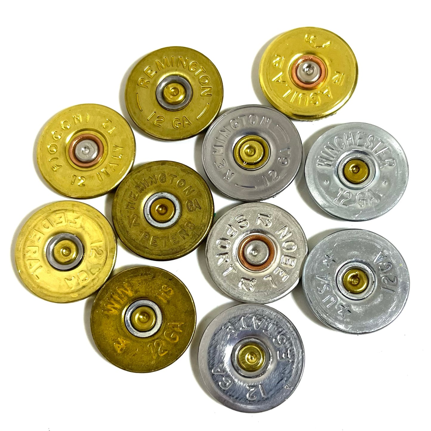 Ten 12 gauge shotgun shell slices arranged in a ring showing mixed gold and silver metallic bases.