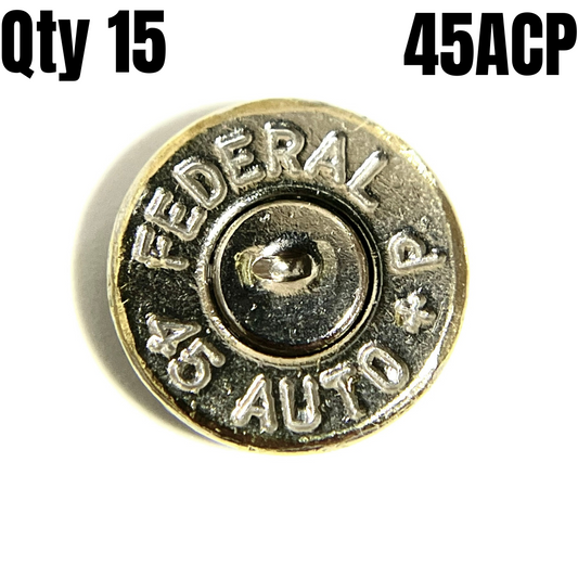 A polished 45 ACP nickel bullet slice showing a Federal 45 Auto +P headstamp with text Qty 15 and 45ACP.
