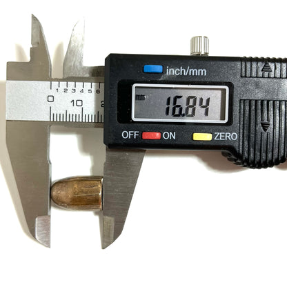 Digital caliper measuring the length of a fired 45 ACP bullet showing 16.84 mm