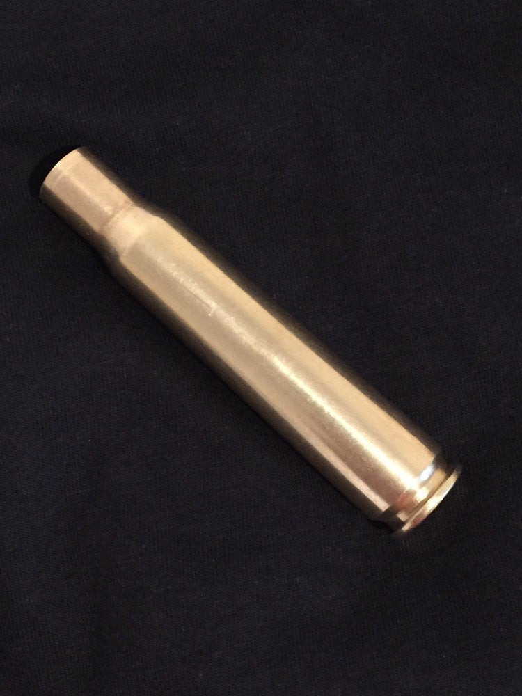 Hand-polished .50 BMG brass casing made from genuine military-surplus brass.