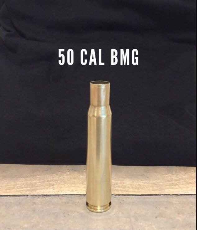 A single hand-polished .50 BMG brass casing for craft and display use.