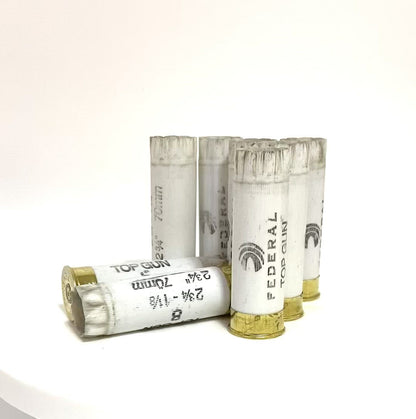 Empty White Once Fired Shotgun Shells