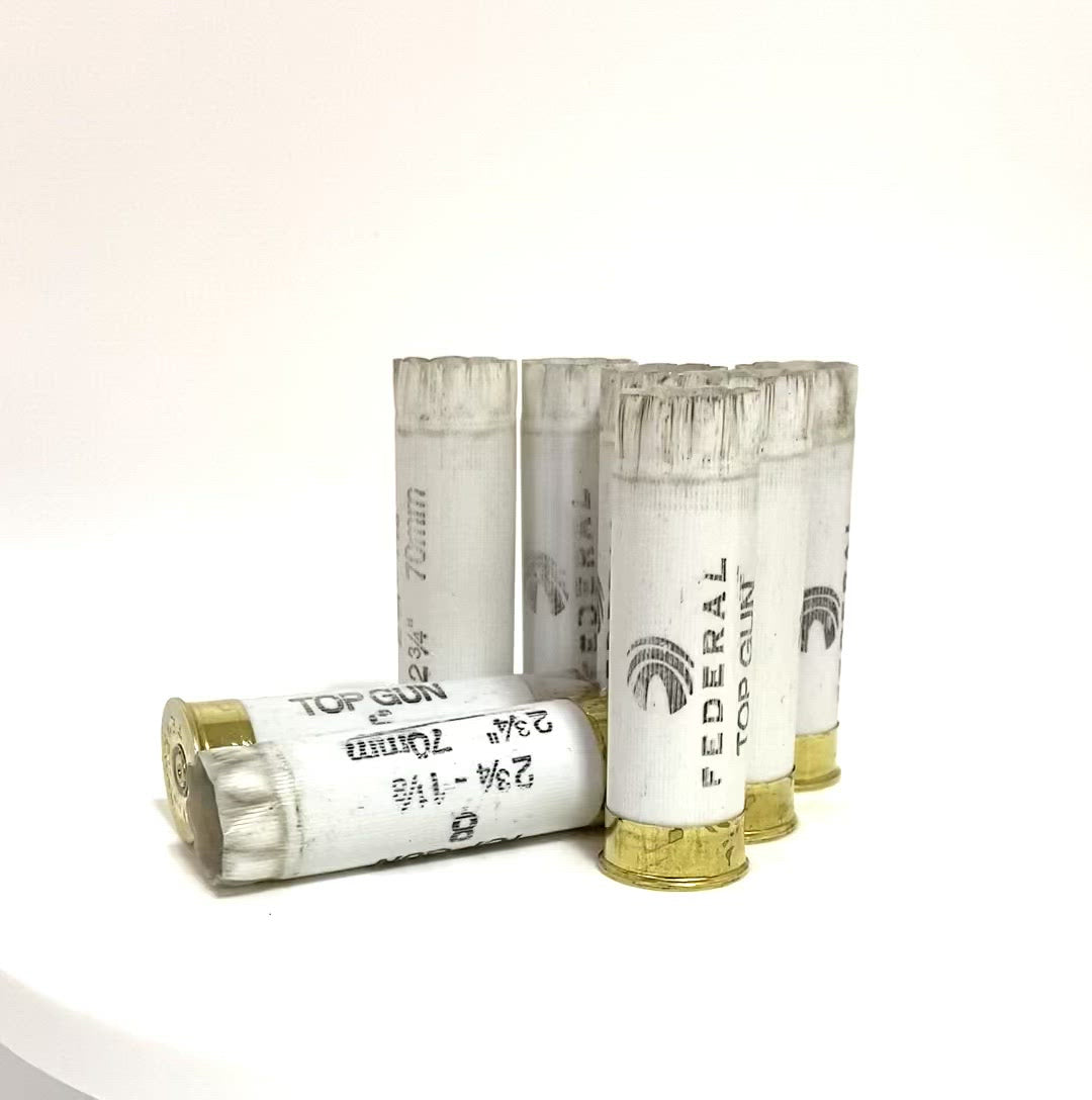 Empty White Once Fired Shotgun Shells