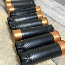 Load image into Gallery viewer, Black and Copper Colored Used Shotgun Shells
