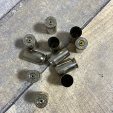 Load image into Gallery viewer, Nickel Drilled 45 Caliber Brass Shells 
