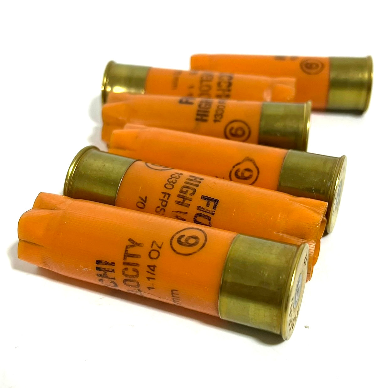 Orange Used 12 Gauge Shotgun Shells