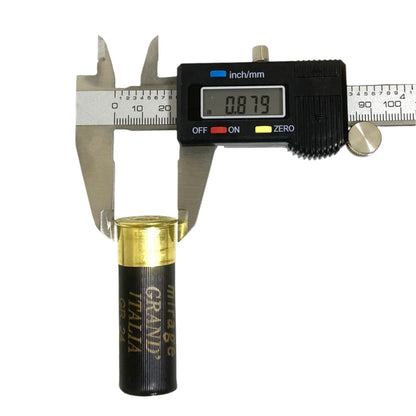A digital caliper measuring the brass base diameter of a black empty shotgun shell.