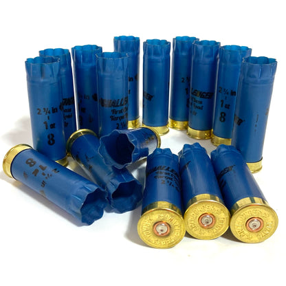 Ring of once-fired blue Challenger shotgun shell hulls with headstamps visible in foreground
