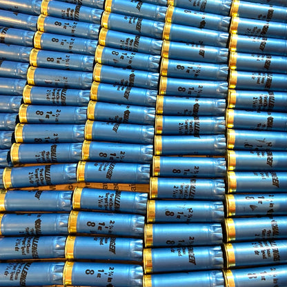Bulk array of blue Challenger 12 gauge shotgun shell hulls
