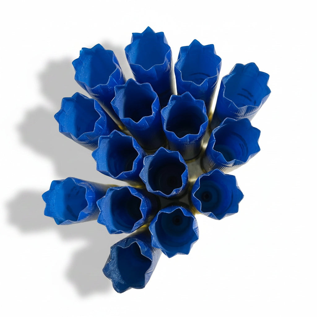 Top-down view of star-crimped blue Challenger shotgun shell hulls