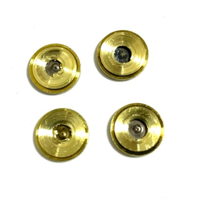 Four brass slices shown at an angle highlighting thin edges, backside arranged in a grid on white background
