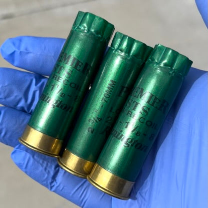 Remington Premier STS Dark Green 12 Gauge Hulls Held In Hand