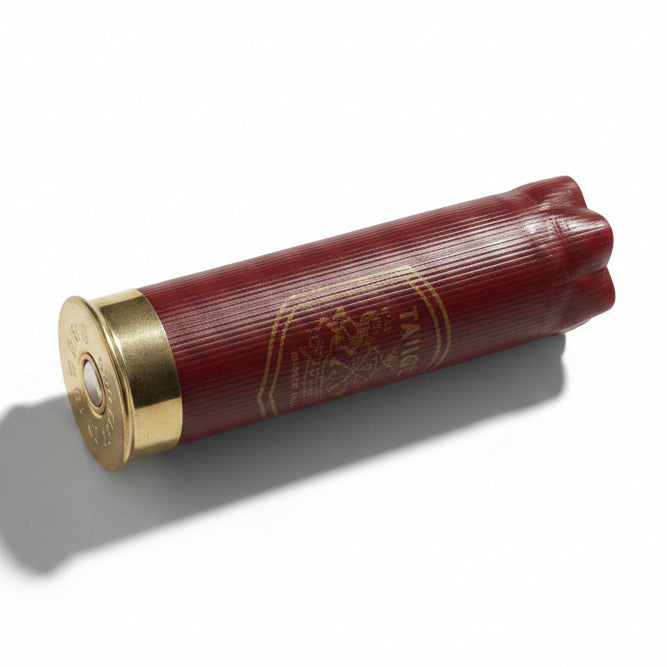 Dark Red Herter's Shotgun Shell Shown Beside Ruler For Scale