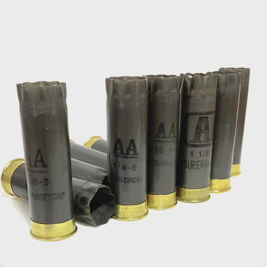 Empty 12 Gauge Gray Shotgun Shells With Gold Bottoms