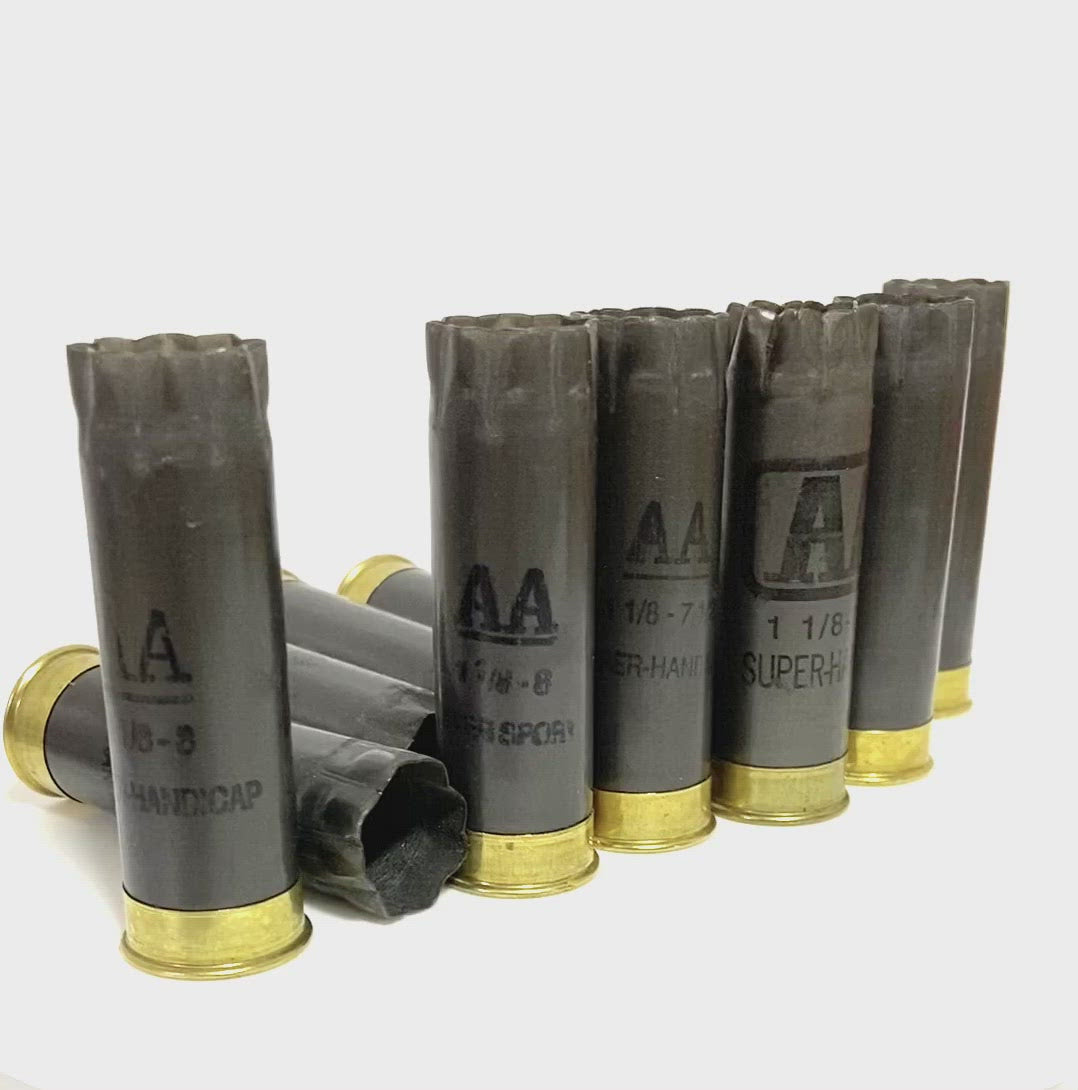 Empty 12 Gauge Gray Shotgun Shells With Gold Bottoms