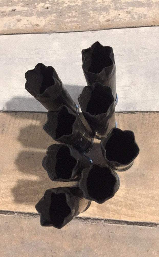 Used Black Empty 12 Gauge Hulls 