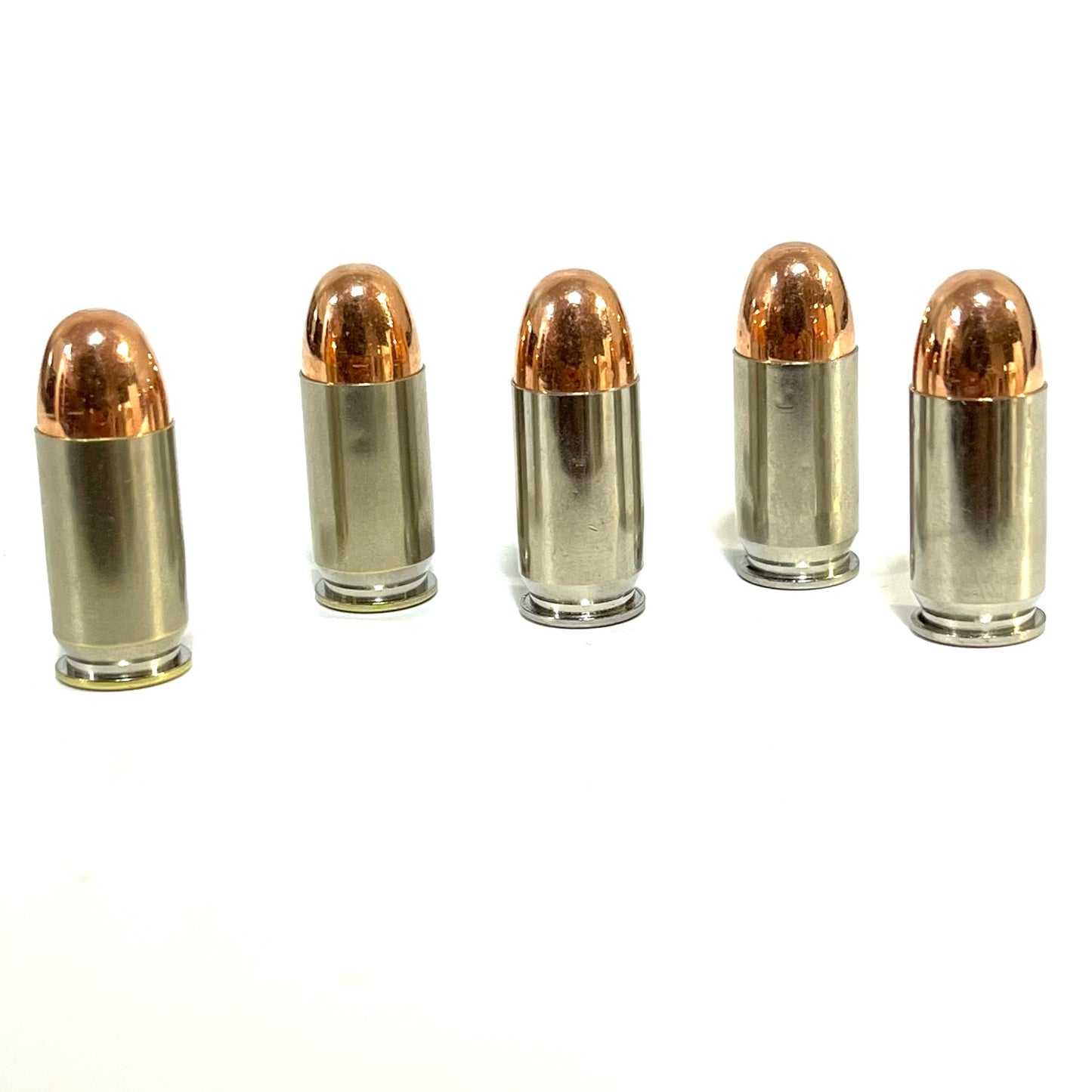 Five fake bullets for a costume cosplay arranged upright in a line on a white background.
