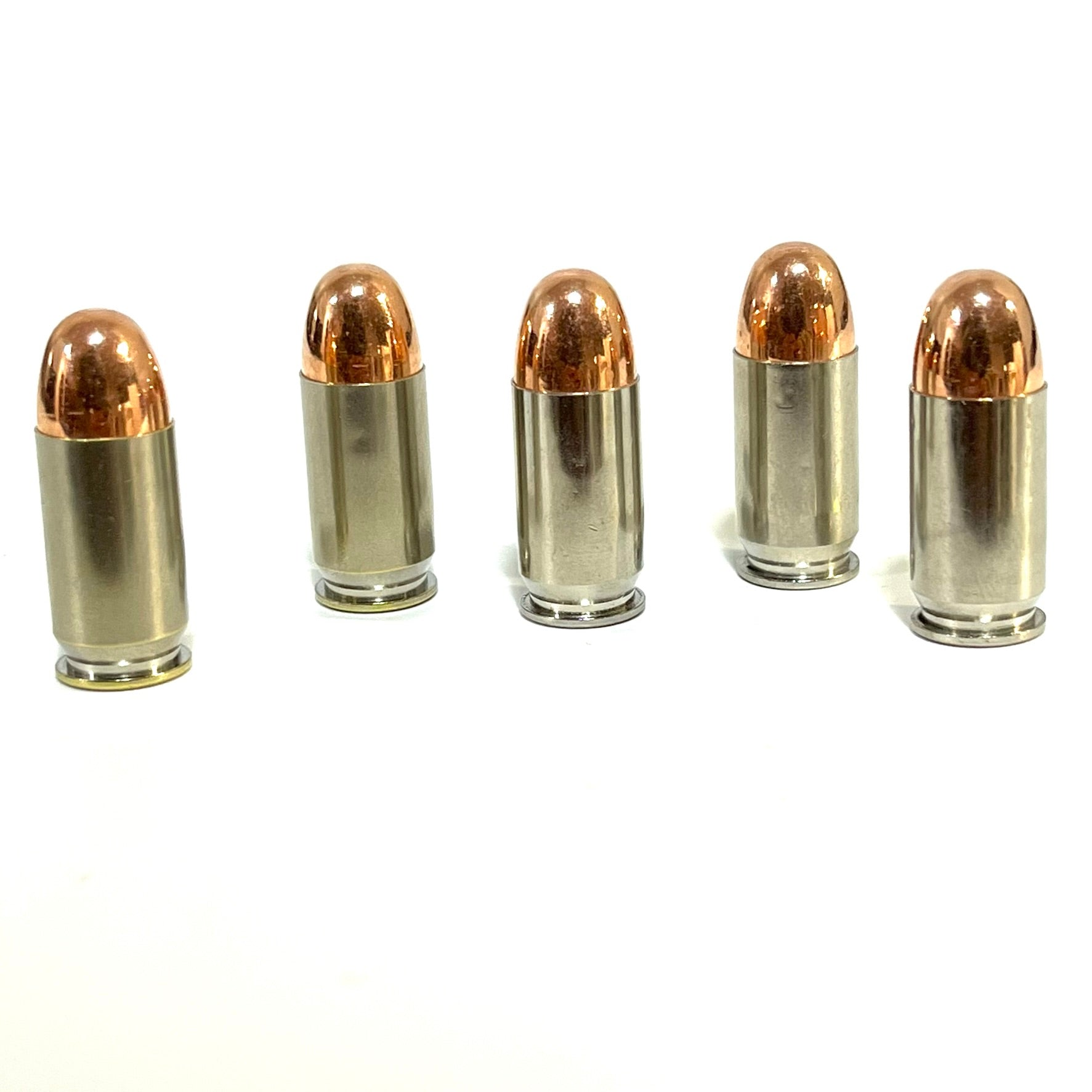 Five fake bullets for a costume cosplay arranged upright in a line on a white background.