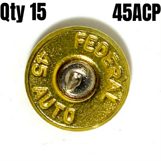 Gold Federal 45 ACP bullet slice with headstamp reading FEDERAL and 45 AUTO on a white background.
