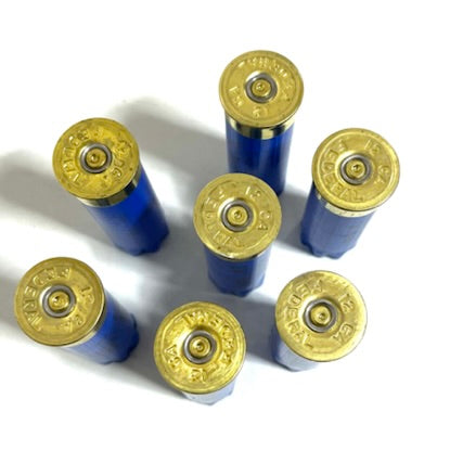 Gold headstamps on blue Federal 12ga hulls showing silver and gold spent primers.