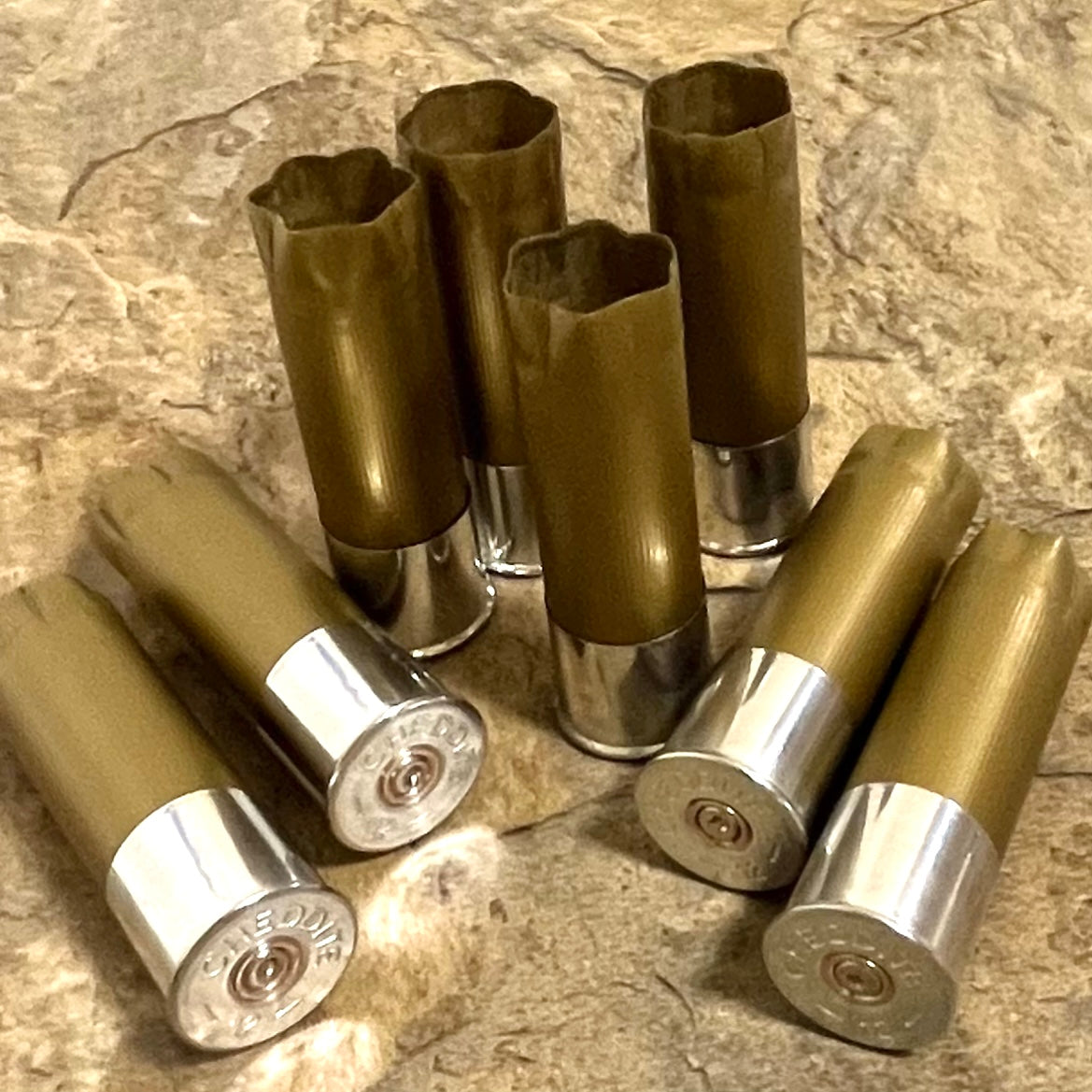 Empty Gold And Silver Shotgun Shells