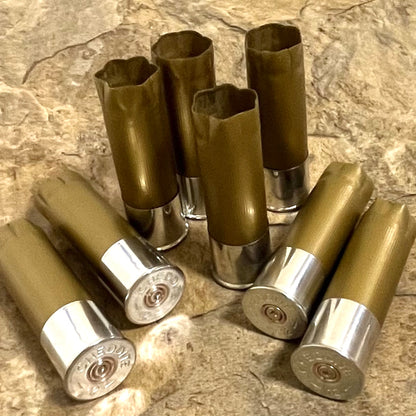 Empty Gold And Silver Shotgun Shells