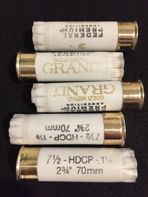WHITE 12 gauge shotgun shells with gold bottoms