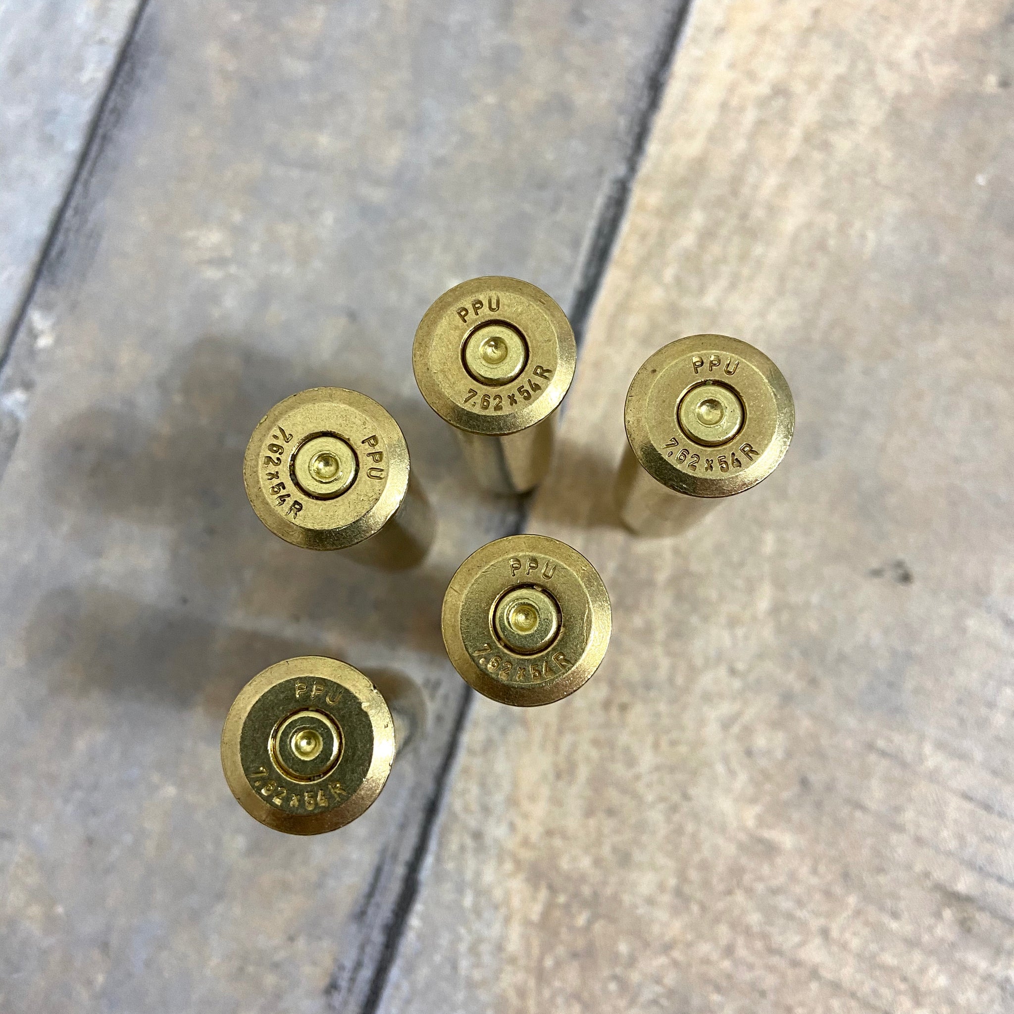 Empty Rifle Shell Casings by Stocksy Contributor Matthew Spaulding -  Stocksy
